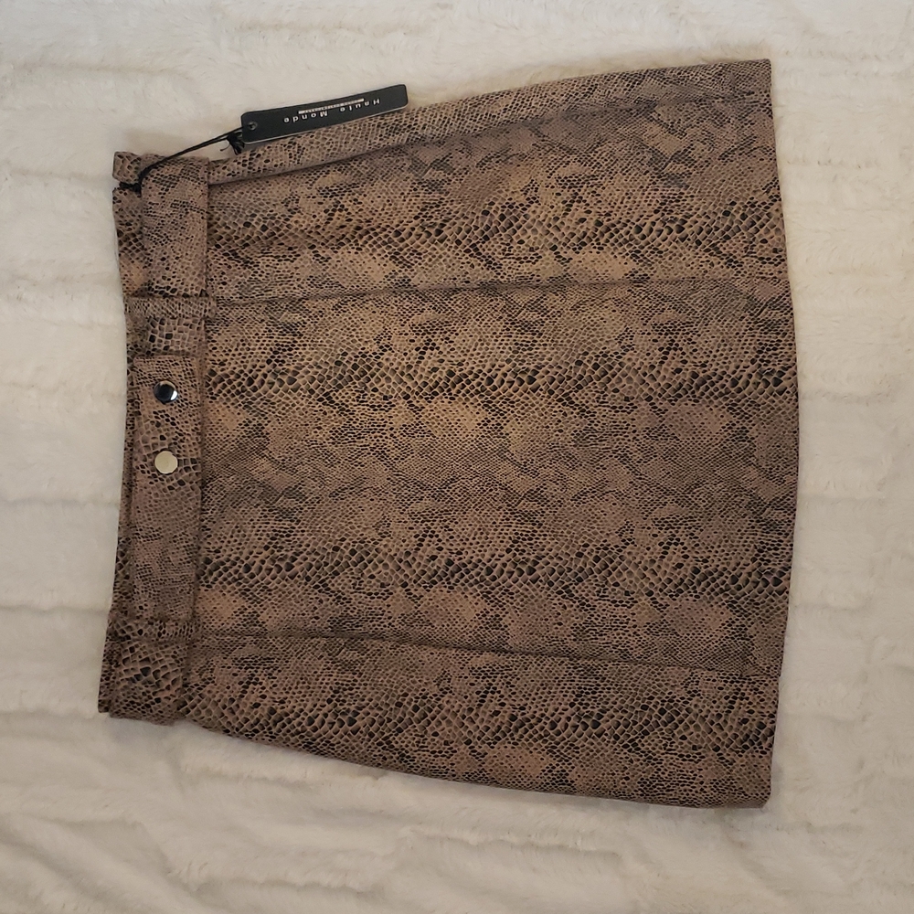 Never worn faux snake skin mini skirt